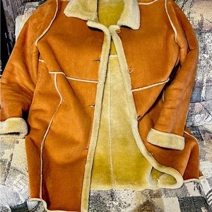 Woman sued jacket used like new inside fur beautiful .